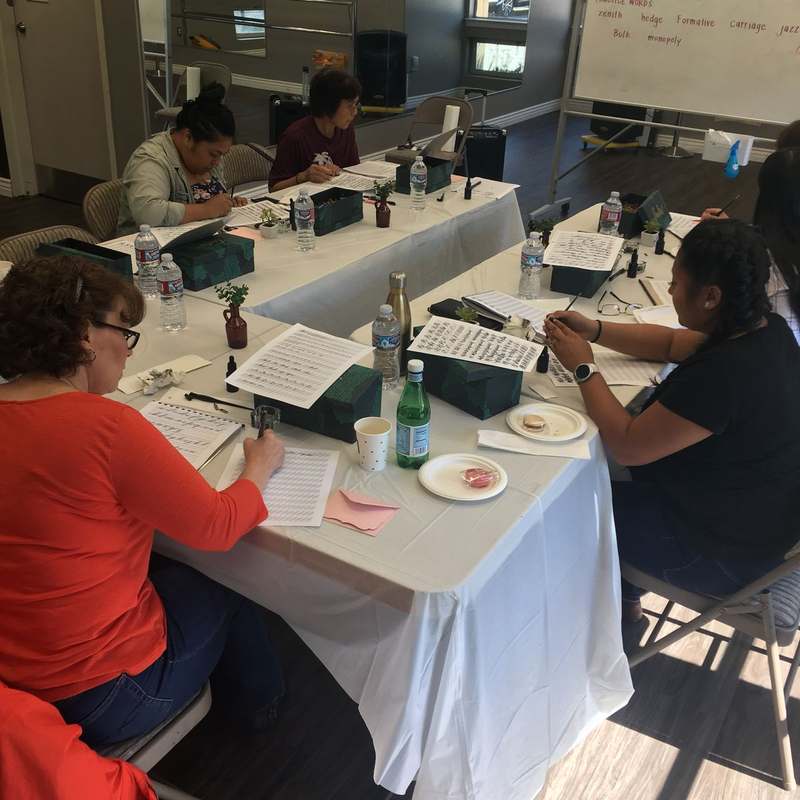 Calligraphy workshop in session